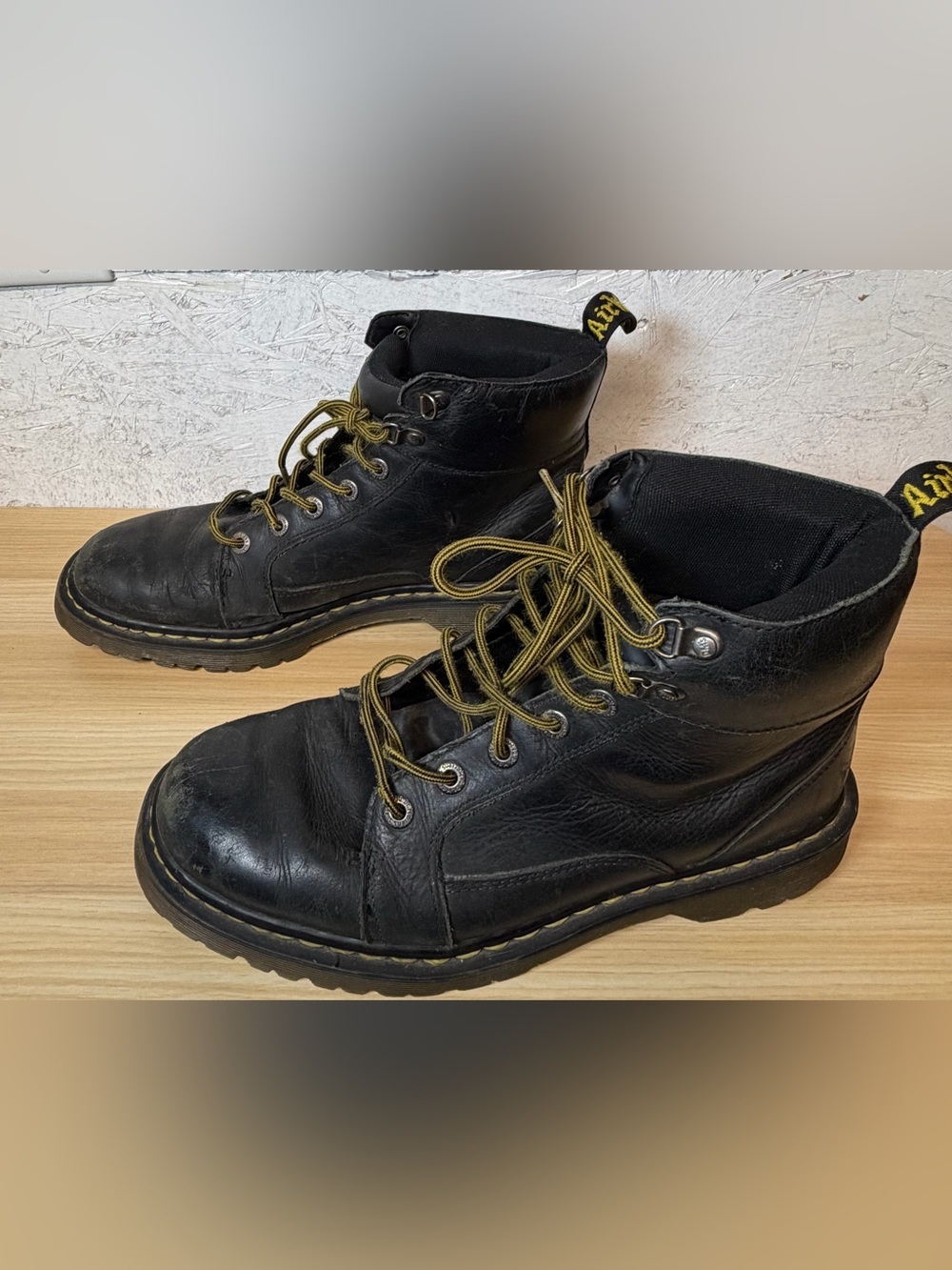 Dr. Martens Black Leather Lace-Up Ankle Boots with Yellow Accents